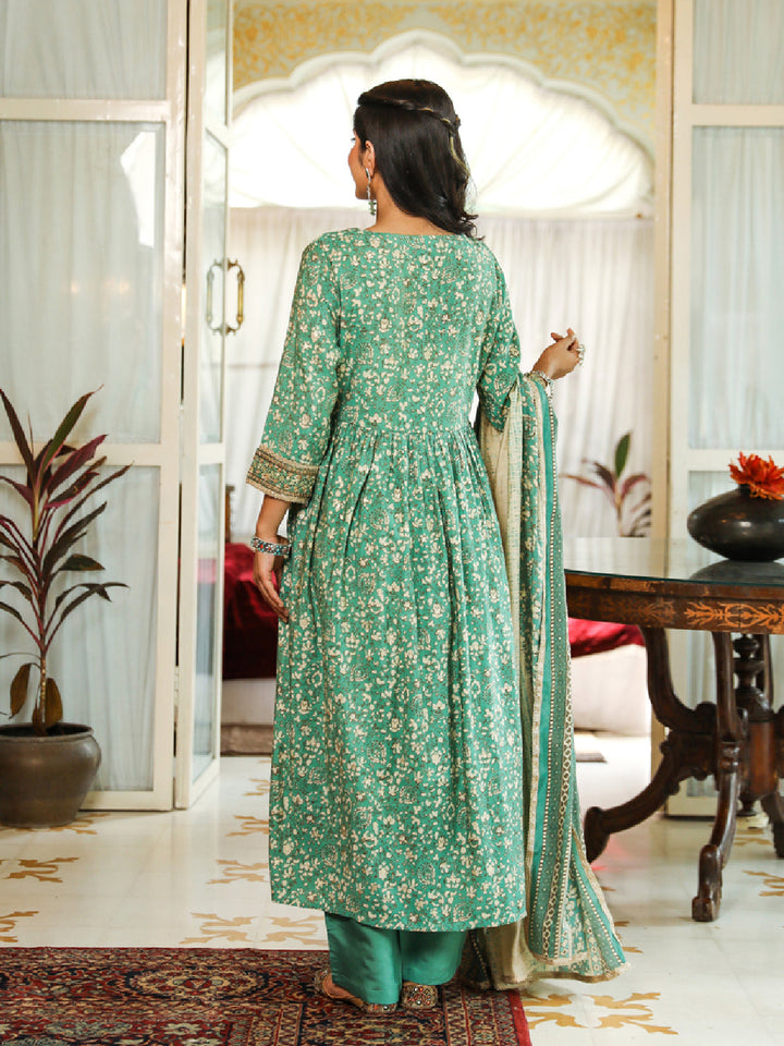 Nehamta Green Color Cotton Cambric Nyara Cut A-Line Women's Kurta Trouser Dupatta & Fancy Potli