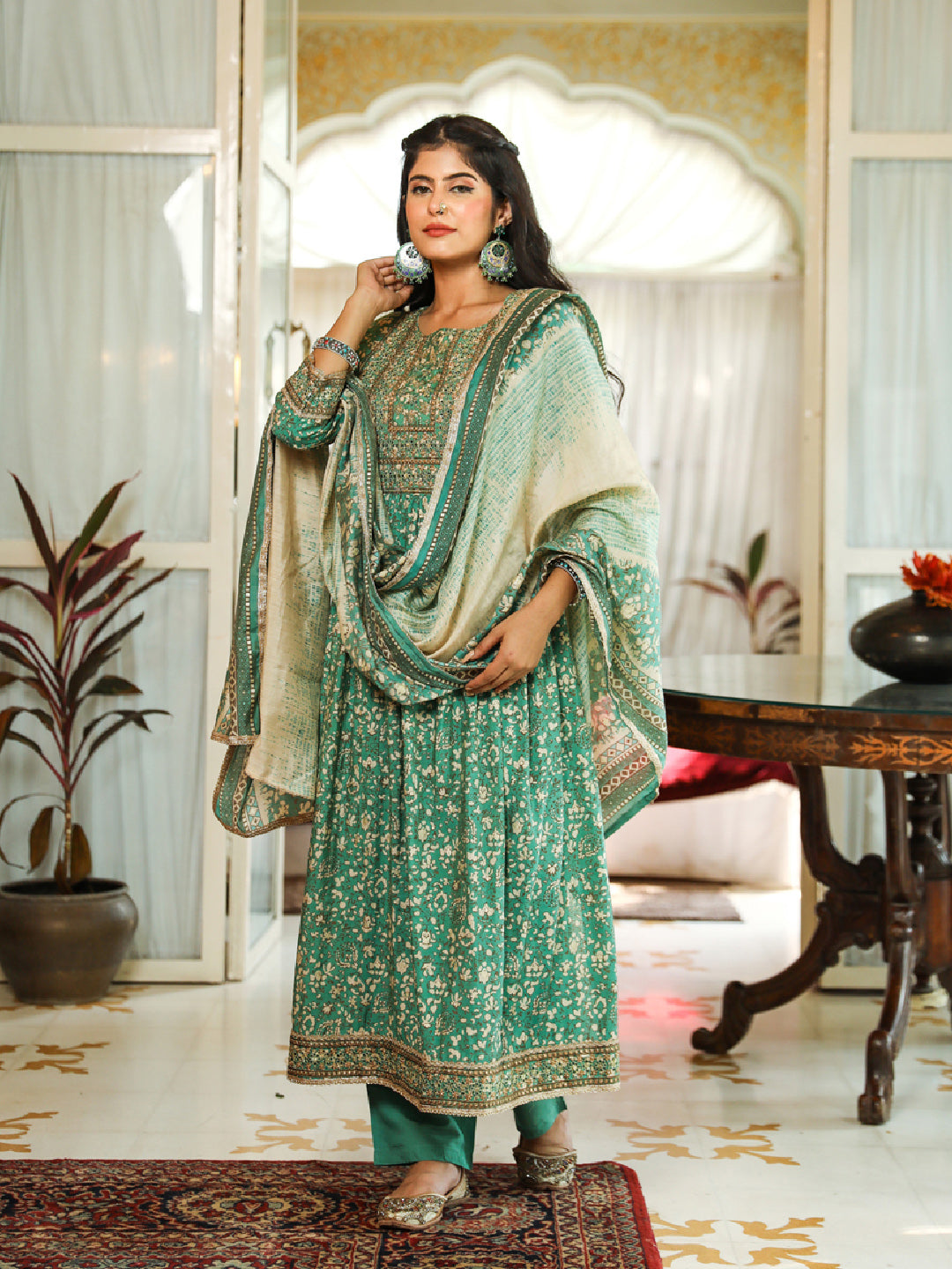 Nehamta Green Color Cotton Cambric Nyara Cut A-Line Women's Kurta Trouser Dupatta & Fancy Potli