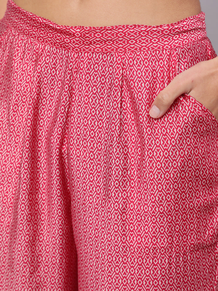 Women Pink Muslin Nyara Cut A-Line Kurta Trouser Dupatta & Fancy Potli Set