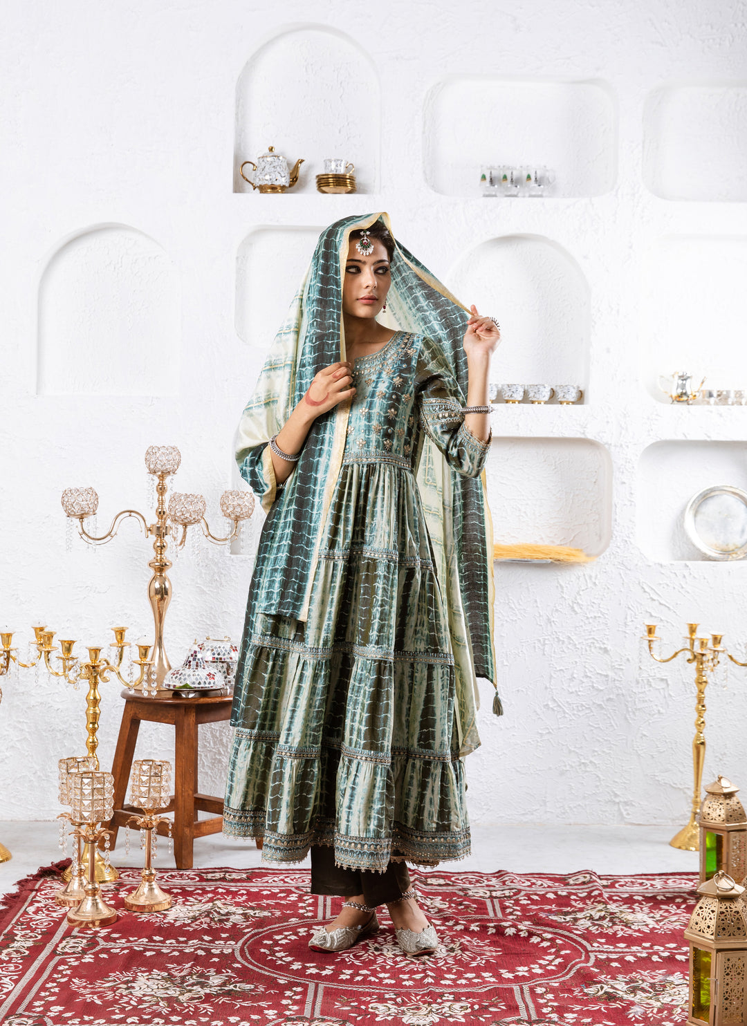 Ruhaniyat Women's Green Silk Tiered Kurta Pant Dupatta With Fancy Potli