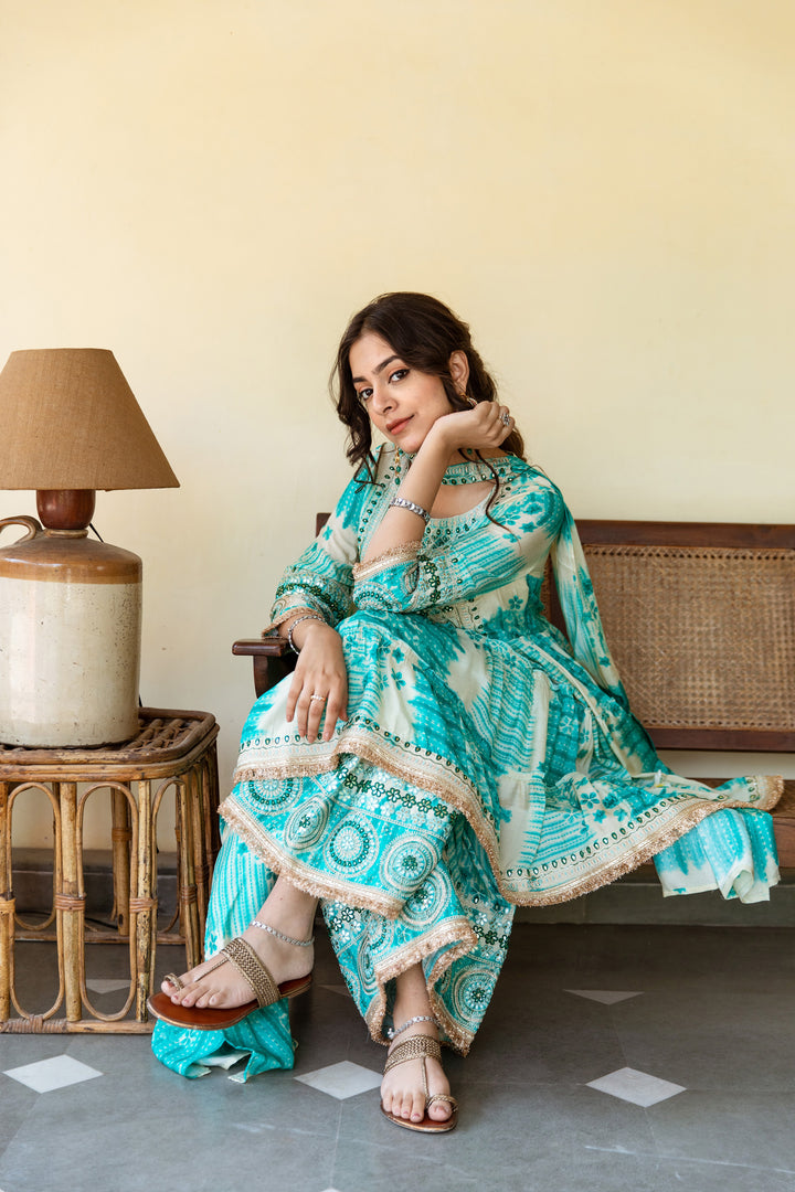 Nilambar Women's Turquise Color Silk Anarkali Kurta Sharara Dupatta With Fancy Potli