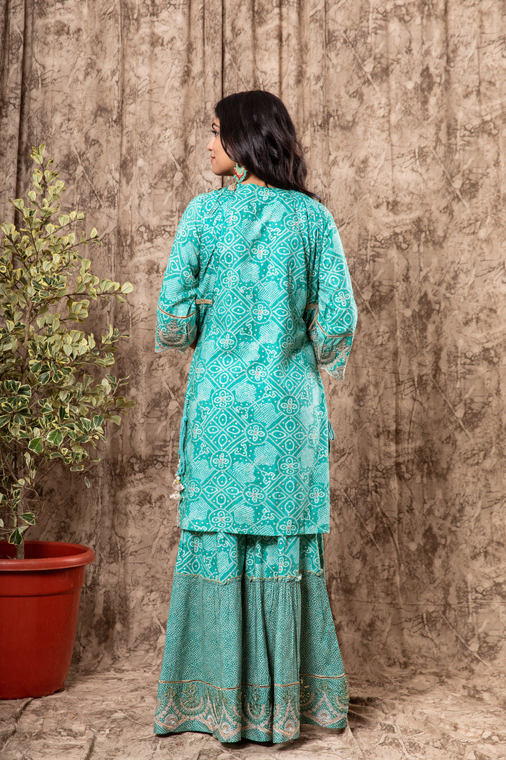 Nilambar Women's Turquoise Color Rayon Straight Kurta Sharara Dupatta With Fancy Potli
